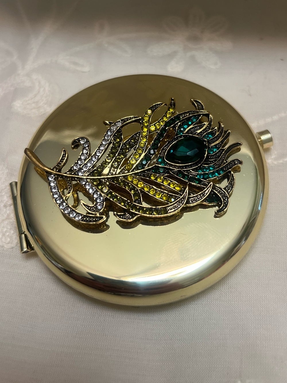 Handcrafted Gold Compact Mirror with Jeweled Peacock Feather Brooch